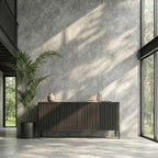 dark oak sideboard, potted plant, and large windows.