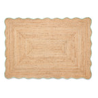 Beige braided rug on a white background